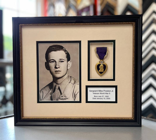 Restored Service photograph and Purple Heart medal, Larson Juhl black with gold beaded lip and double mat, featuring floated medal in shadowbox.