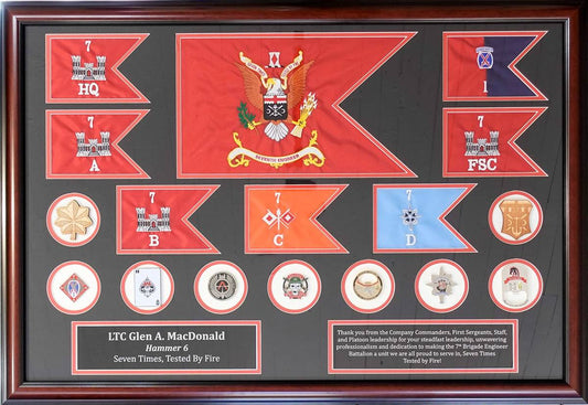 Restored Army commemorative shadowbox with banners, coins, new matting, and Conservation Clear Glass.