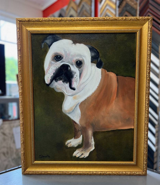 Oil painting of a bulldog named Otis framed in ornate gold Larson Juhl frame with beaded inner edge.