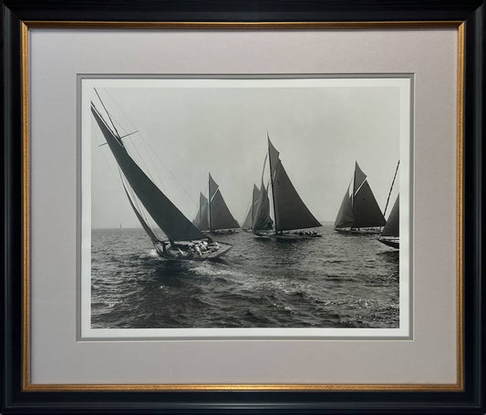 Black-and-white sailboat regatta photograph framed in Larson Juhl Académie Black and Gold with grey matting and Museum Glass for preservation.
