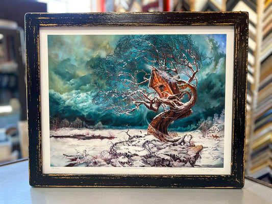 Limited-edition “Treehouse” artwork framed in handcrafted black-and-gold distressed Chester Frame Company moulding with Conservation Glass.